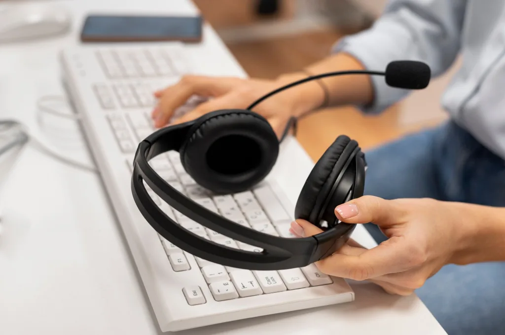 holding pair headphones