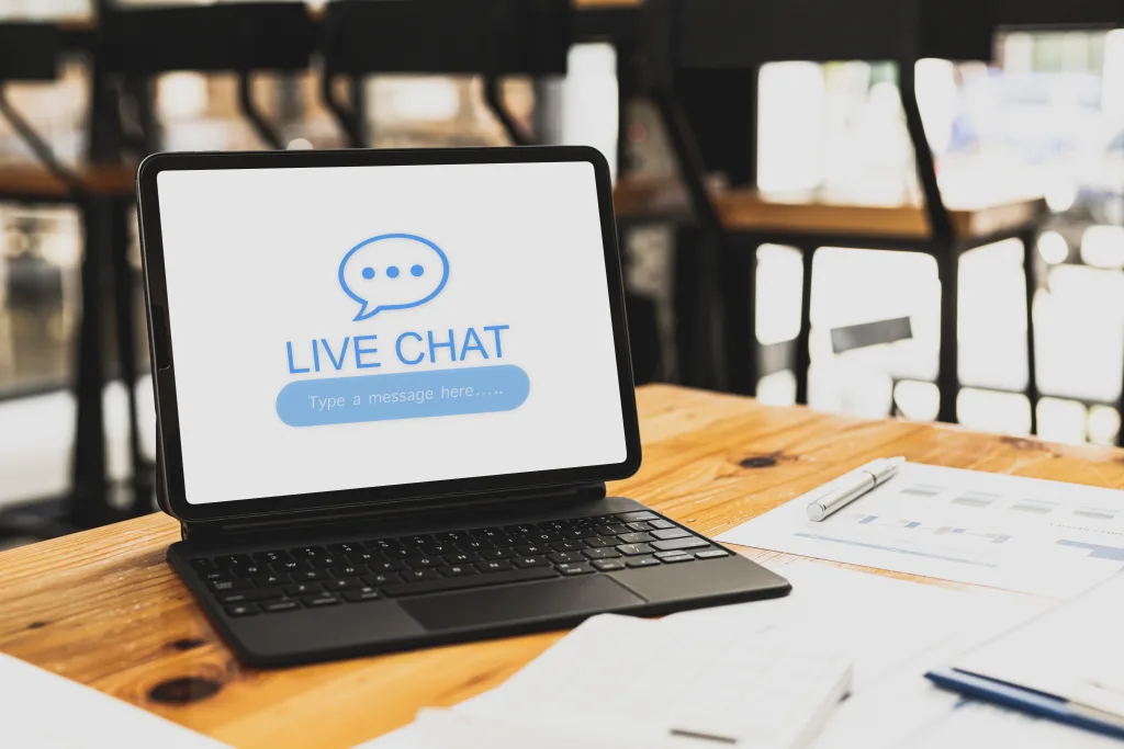 tablet-sits-desk-screen-displaying-live-chat